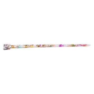Detail of acetate hair stick featuring pink, yellow marble pattern and a pink gemstone