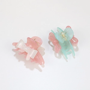 Pastel acrylic bow hair claw clips set for women in soft green and pink tones