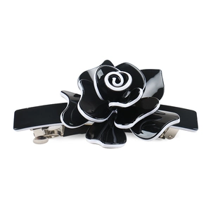 Classic black and white acrylic rose spring hair clip with glossy finish and silver base