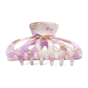 Detail shot of large acetate hair claw clip with purple marble pattern and polished finish