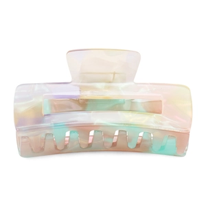 Detail of large rectangular hair claw clip with colorful iridescent pearly texture