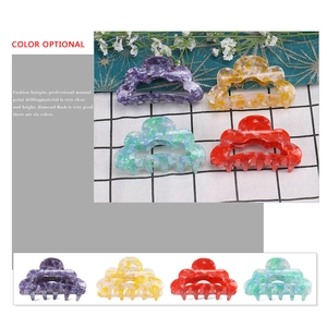 Minimalist marble pattern hair claw clips in purple, yellow, green and red colors