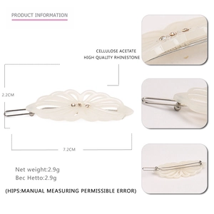 Cream cellulose acetate hollow flower hair clip with rhinestones and metal fastener