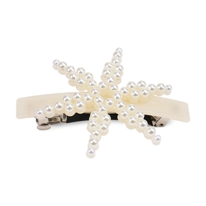 Detail showing elegant pearl star pattern on 8cm cream spring hair clip for women