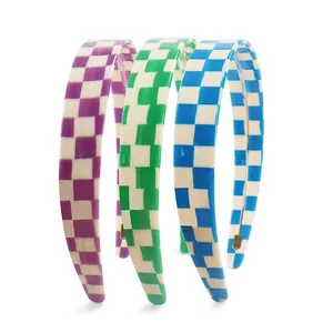 Three-piece colorful checkerboard wide headbands in purple, green, and blue glossy finish