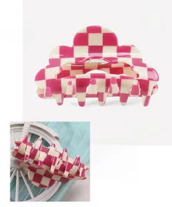 Pink and beige checkerboard acetate hair claw clip measuring 8.6x4.6cm and weighing 21.3g