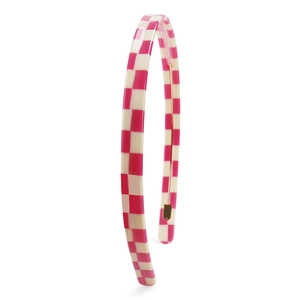 Detail view of the 1cm wide pink and beige checkerboard pattern on the acetate headband