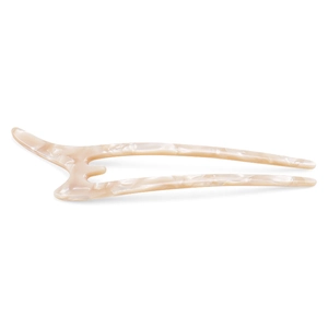 Macro view of wave-shaped acetate U-shaped hair fork pin with cream marble texture