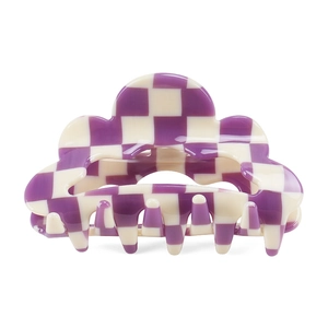 Detail of purple and beige checkered shark hair claw clip with wavy cloud edges