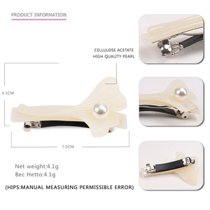 Cream floral cellulose acetate hair clip with pearl detail and dimensions shown