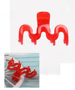 Pinza per capelli rossa in acetato di cellulosa con design a onde di 6,5 cm