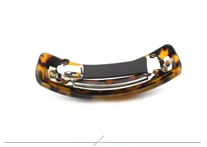 Detail view of leopard print acetate hair clip showing the silver metal spring buckle mechanism