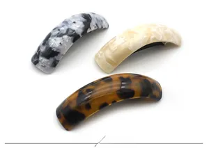Three-piece acetate hair clip set with marble, dolomite, and tortoiseshell patterns