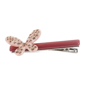 Dettaglio del fermaglio per capelli in acetato rosa con strass e denti in metallo