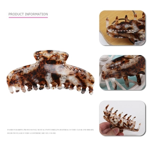 Elegant amber tortoiseshell shark hair claw clip with rhinestones for thick hair