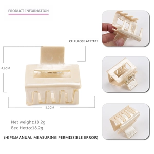Cream square cellulose acetate hair claw clip with cutout design and 5.2cm width