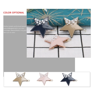 Star shaped pearl hair clips in blue, khaki and pink colors with metal base