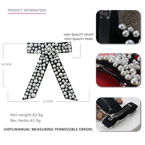 Elegant black velvet bow hair clip with white pearls, size 14.5x11cm for women