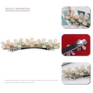 Pince à cheveux florale en acétate avec pétales dégradés rose et vert et strass