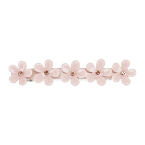 Détail de la barrette à fleurs en résine rose avec cristaux sur pince en métal argenté