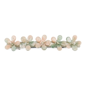 Détail d'une barrette avec cinq fleurs en acétate coloré et cristaux étincelants