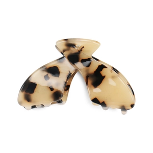 Elegant tortoise shell claw clip in cream and brown acetate for hair styling