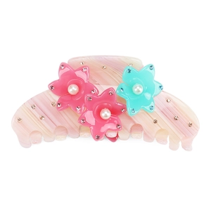 Floral striped hair claw clip with acetate marble pattern and pearl rhinestone accents