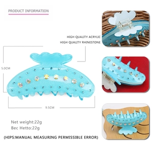 Détails de la pince à cheveux en acrylique bleu clair avec strass colorés et dimensions