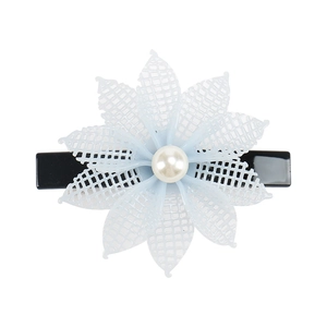 Detail of light blue mesh flower hair clip with pearl center and black spring clip