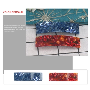 Elegant large marble resin hair claw with floral crystal pattern for ponytail styling