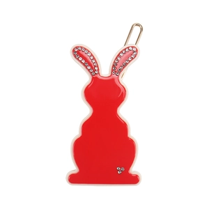 French style red rabbit hair clip with sparkling white rhinestones on white background