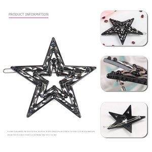 Star-shaped acetate hair clip with sparkling rhinestones and a metallic duckbill base