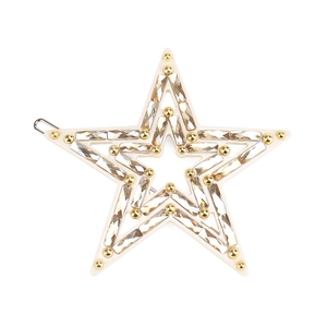 Detailed view of acetate star hair clip with champagne rhinestones and gold beads