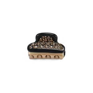 Mini acetate hair claw clip with rhinestones in black and champagne gold finish