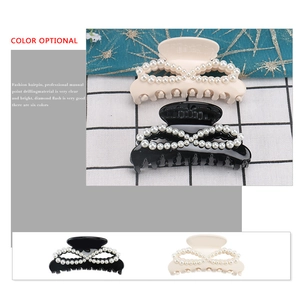 Elegant acetate hair claw clips with pearl inlay in black and cream for women