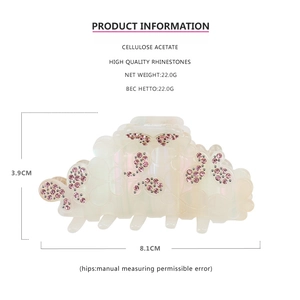 Détails et dimensions de la pince à cheveux papillon en acétate blanc nacré avec strass roses