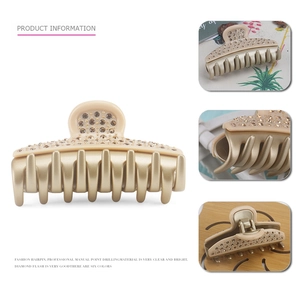 Luxurious beige hair claw clip with brown crystals and multi-tooth design for thick hair