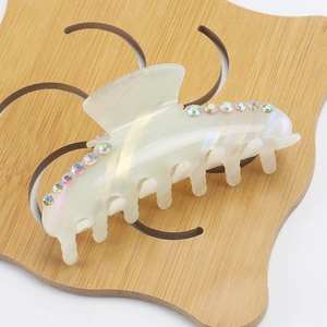 Pearlescent white acetate hair claw clip with colorful rhinestones for women