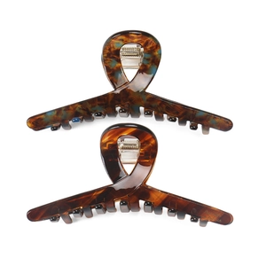 Handmade acetate shark hair clips with tortoise pattern and blue artistic texture detail
