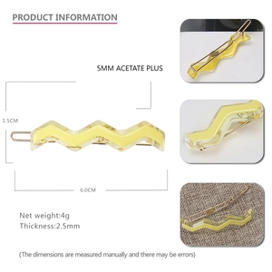 Detailed product size guide for the 6cm yellow wavy acetate hair clip with metal grip