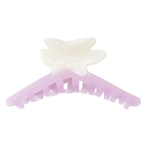 Macro detail of maple leaf hair claw clip with creamy white pearl and lavender finish