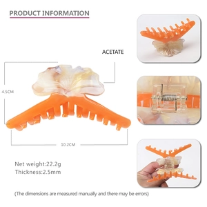 Grande pince à cheveux ginkgo en acétate avec motif floral orange et beige
