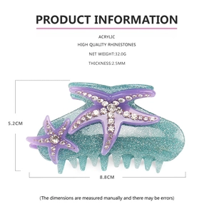 Detail view of starfish shark hair clip with blue sequins and inlaid crystal rhinestones