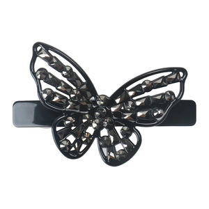 Macro shot of butterfly rhinestone hair clip showing detailed grey crystals and black metal