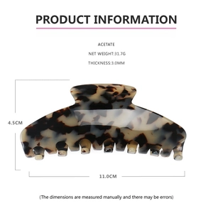 Detail showing dimensions of large acetate hair claw clip with leopard pattern texture