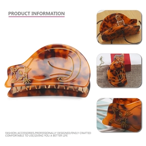 Grande pince à cheveux chat en acétate écaille de tortue avec contours dorés fins
