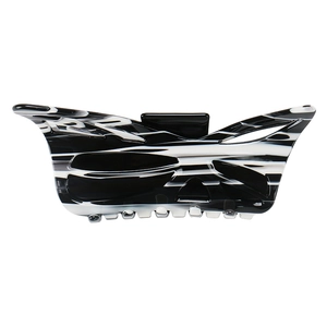 Close-up of black and white marbled acetate hair claw clip with a polished finish