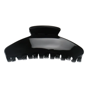 Detailed close-up of a glossy black hair claw clip with smooth resin finish and strong teeth