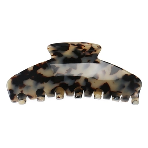 Detailed close-up of large tortoiseshell leopard print hair claw with strong metal spring