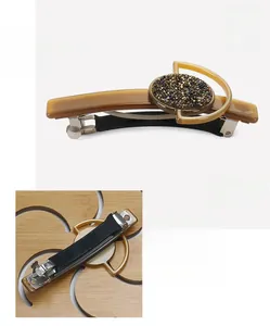 Detail view of acetate hair clip with rhinestones, 8.5x4.2cm size and anti-slip spring clip